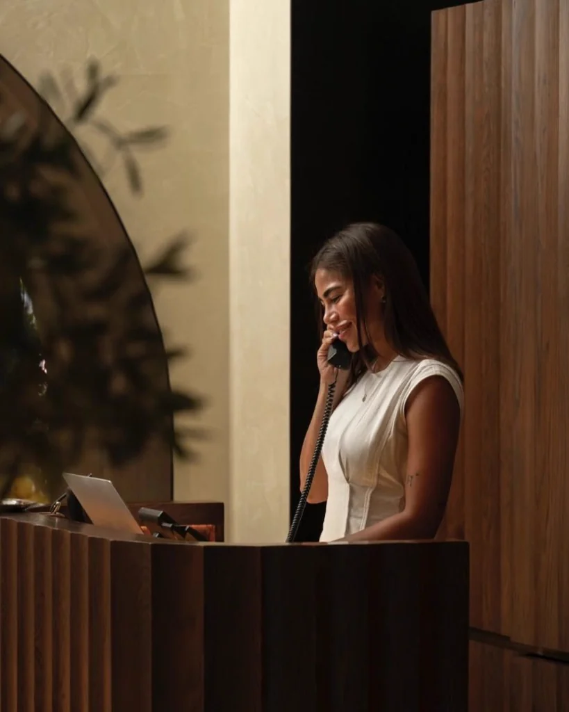Verati assistant taking a call at the desk
